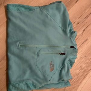 North face 1/4 zip pull over. Long sleeve with small front zipper pocket